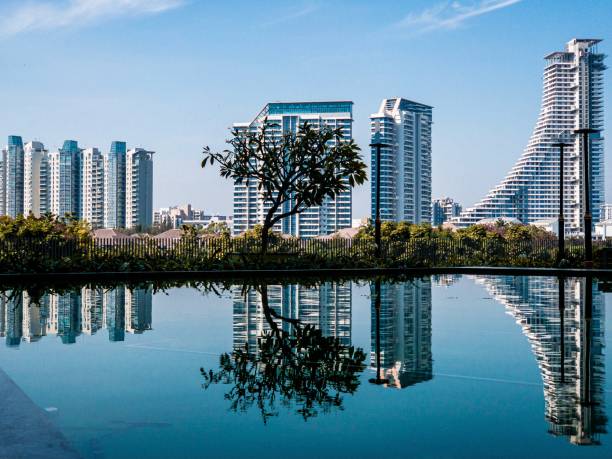 City skyline and it’s reflection on water City skyline and it’s reflection on water